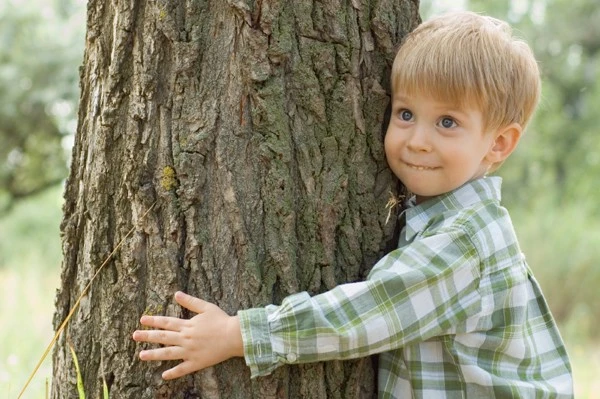 boy-hugging-tree.webp