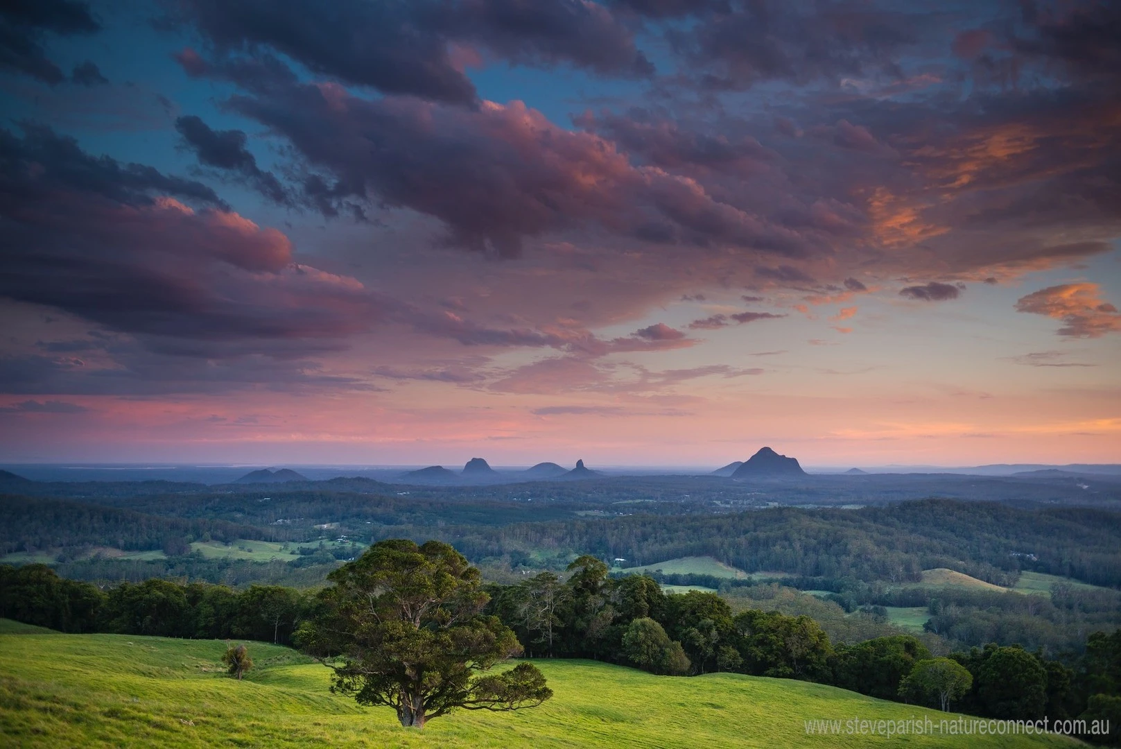 glasshouse-mountains-at-sunset.webp