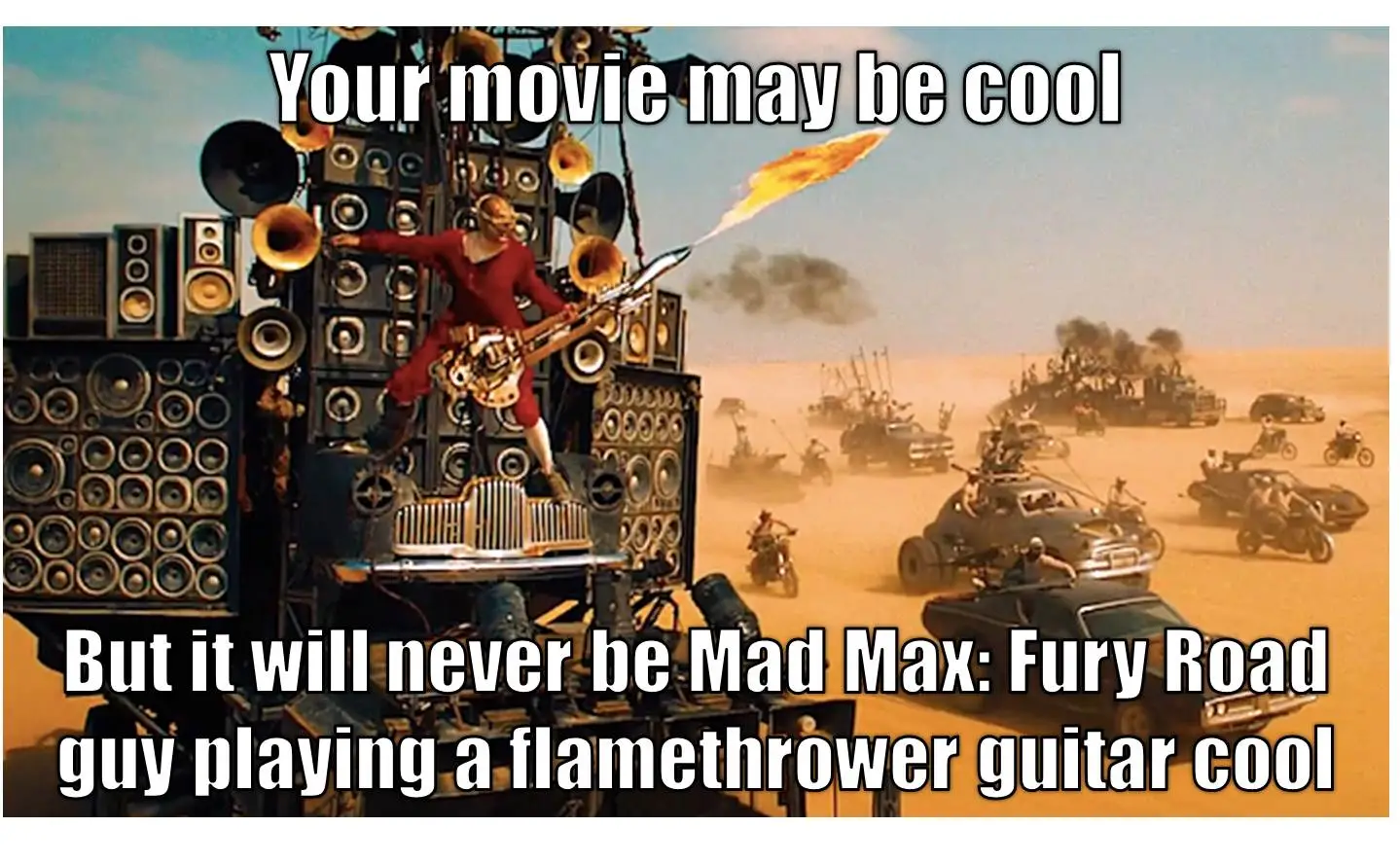 mad_max_fury_road_guy_playing_guitar_cool_meme.webp