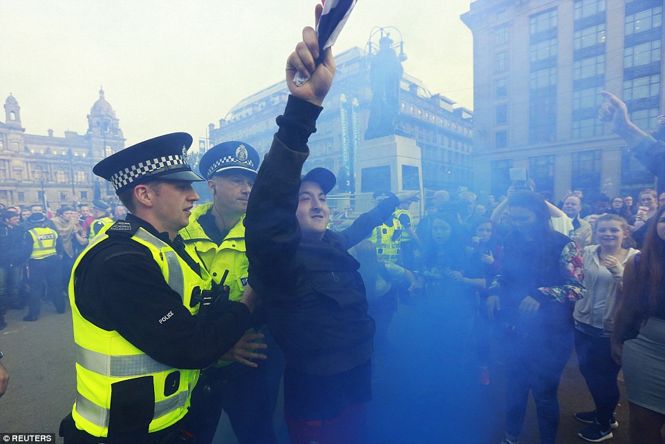 1411157426189_wps_16_A_pro_union_protestor_is_.jpg